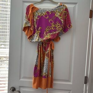 Playful and colorful casual resort dress in bright fuschia and orange